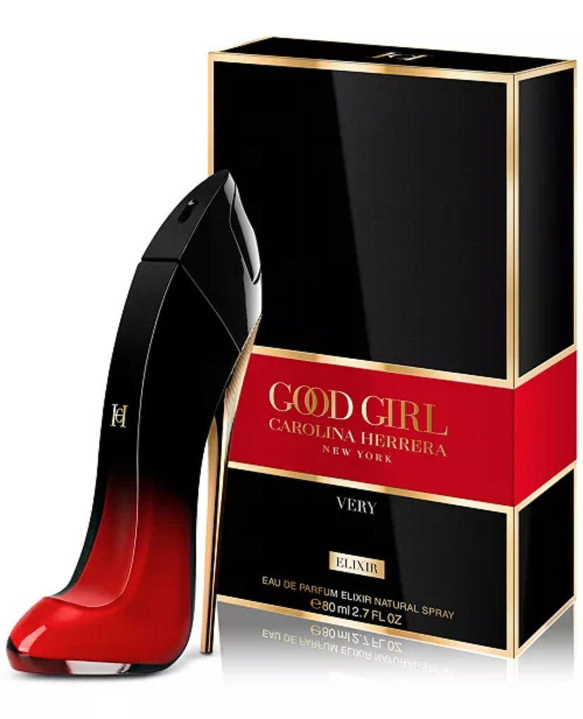 Red high-heeled shoe with 'Good Girl' Carolina Herrera packaging on a white background