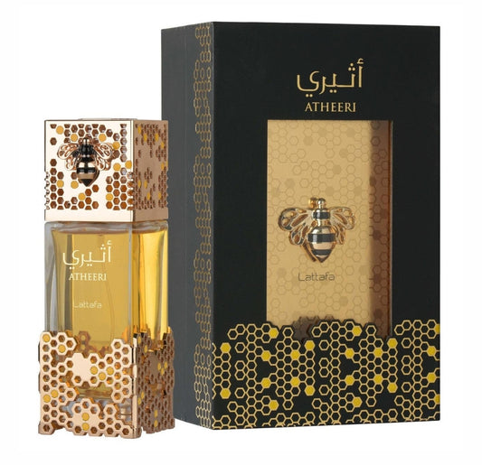 Atheeri de Lattafa Perfumes 3.4oz perfume bottle and packaging, with gold and black color scheme and floral patterns.